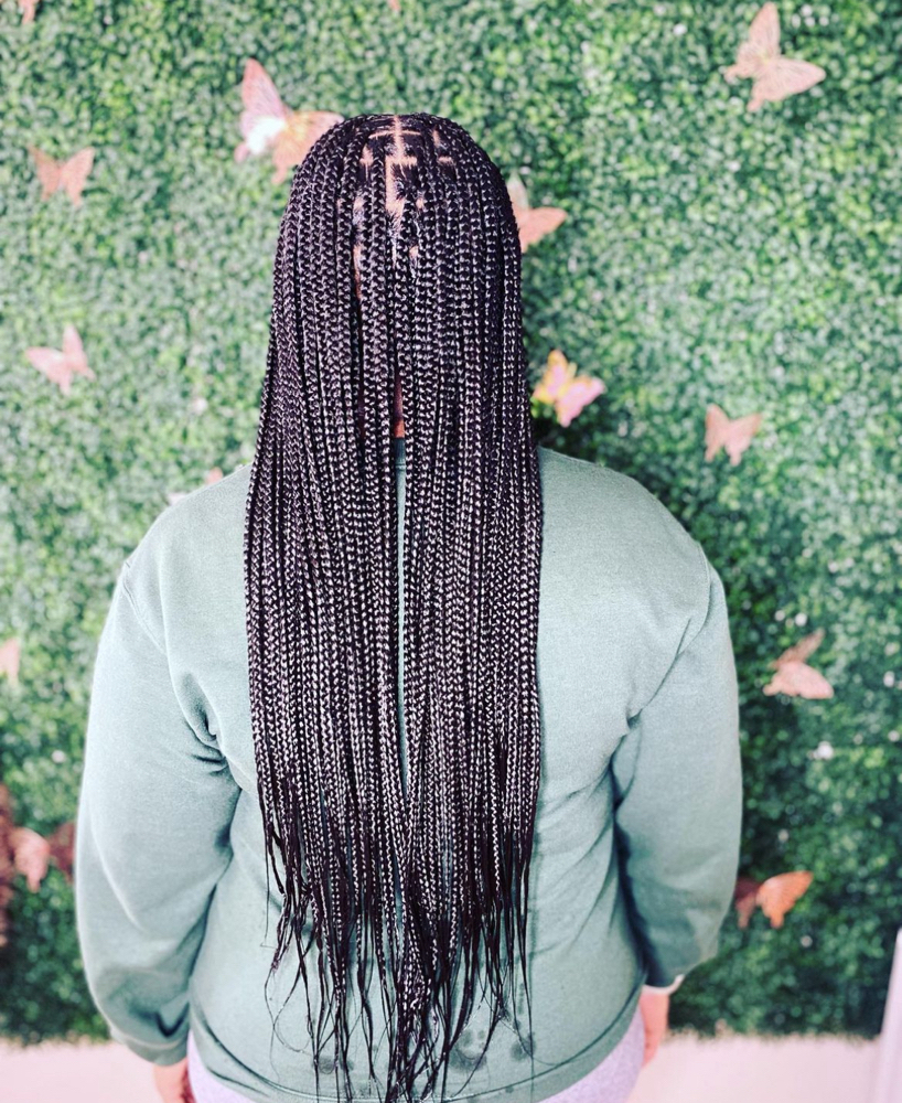 Medium Butt Length Knotless Braids at K.M.H.&S. Braiding in Chicago, IL