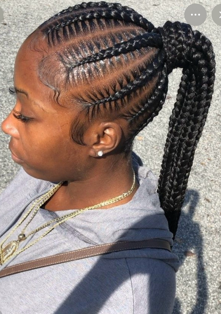 Medium pony tail cornrow at The house of beauty in Atlanta, GA