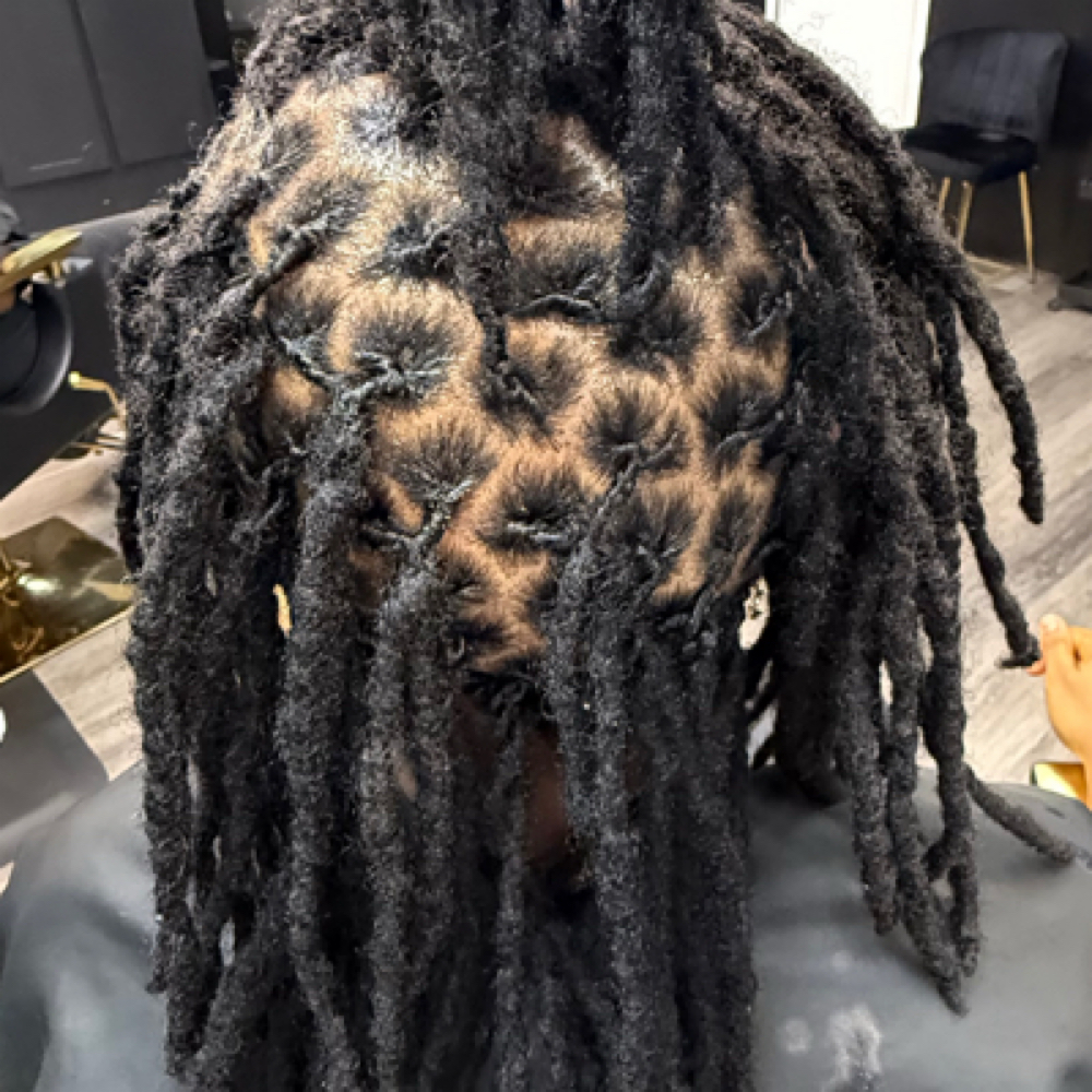 Loc Retie at NaturaLee Styling LLC in Charlotte, NC