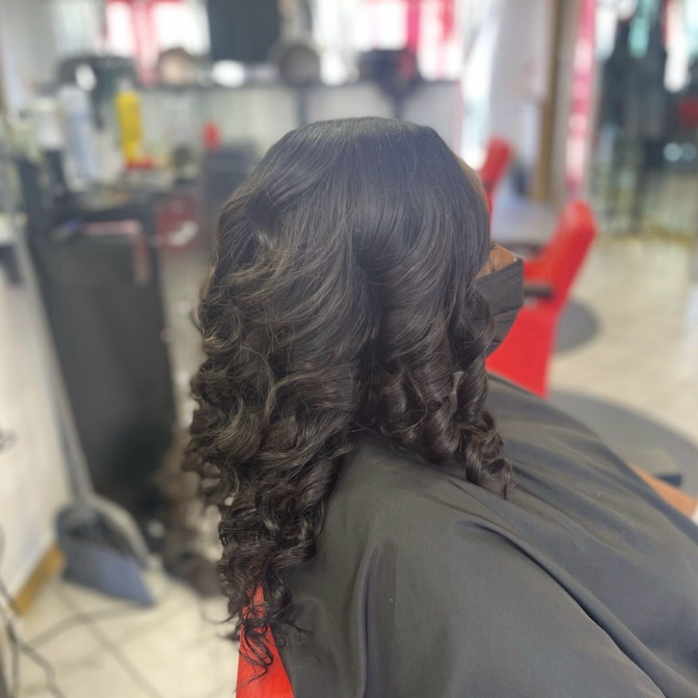 Sew In at Madame Jay Salon in Freeport, NY