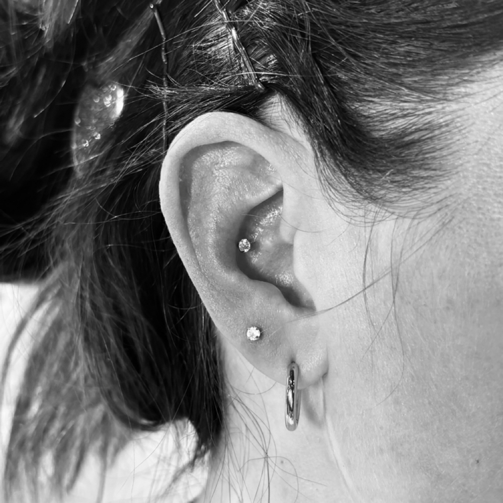 Conch -MINOR at Art & Soul Tattoo/ The Gold Standard Piercing Studio in Conneaut, OH