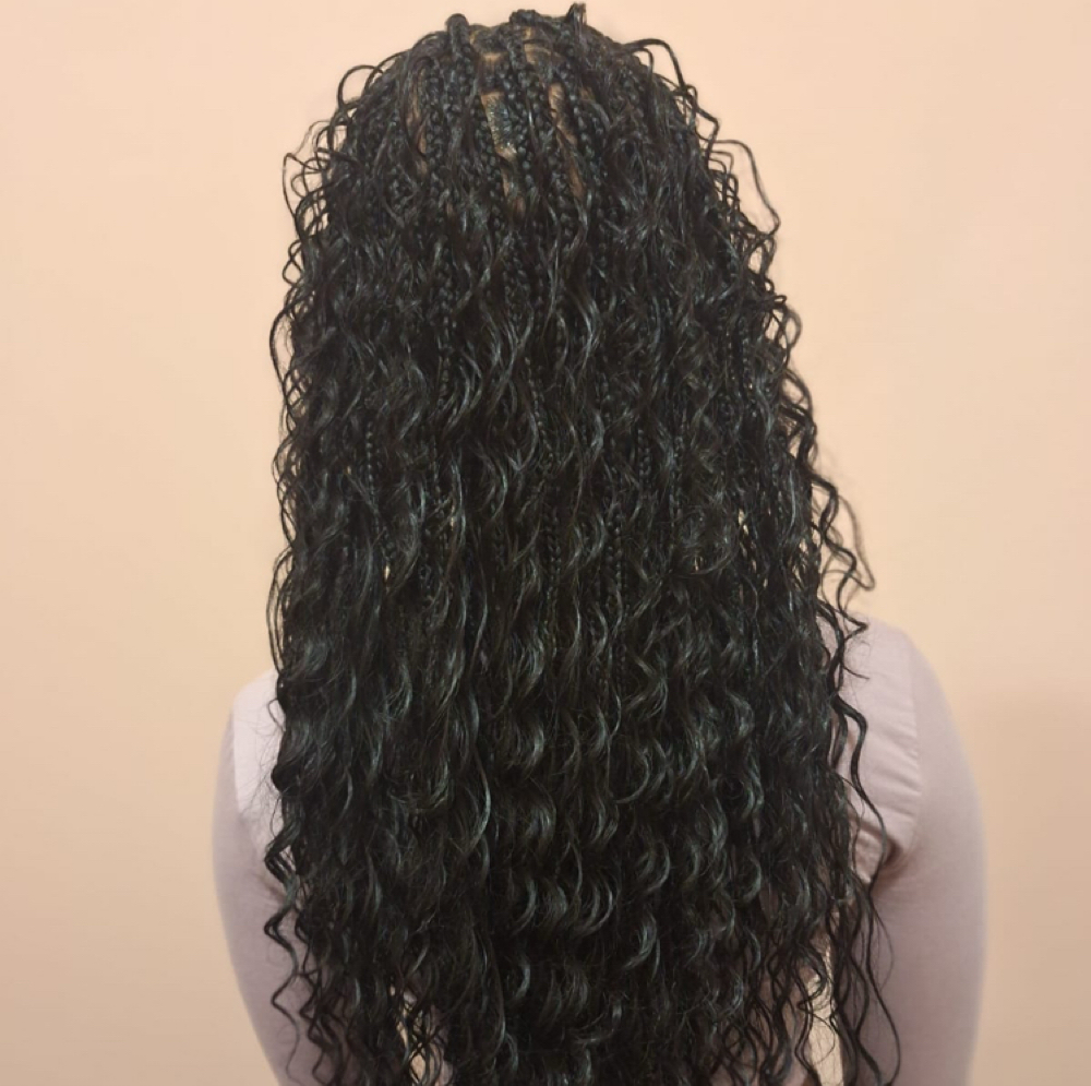 Boho Knotless – Medium (Mid-back) at WestAfrican Beauty Junction Braids in Prosper, TX