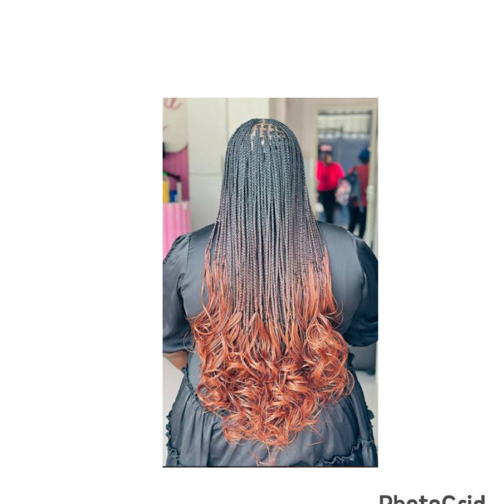 French Curl at NAY HAIR BRAIDING in Springhill, FL