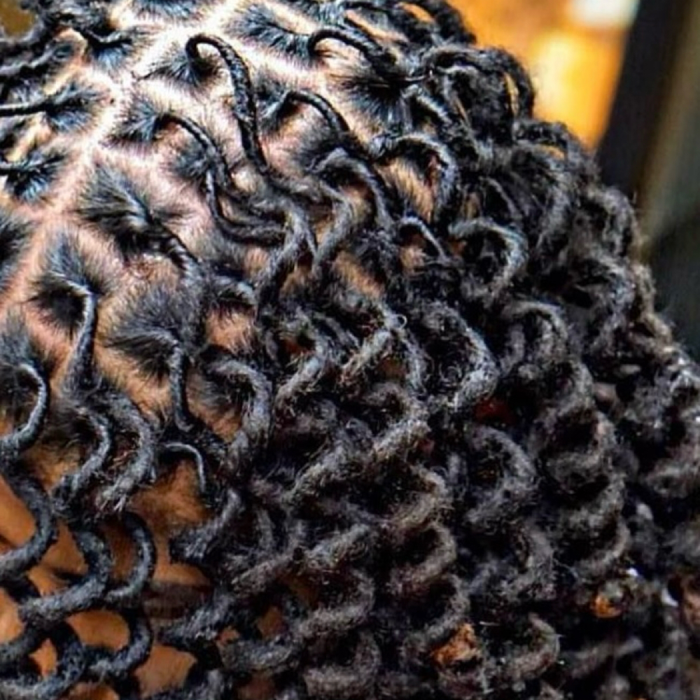 Loc Retwist at Creative Styles by Ty in Kingsland, GA
