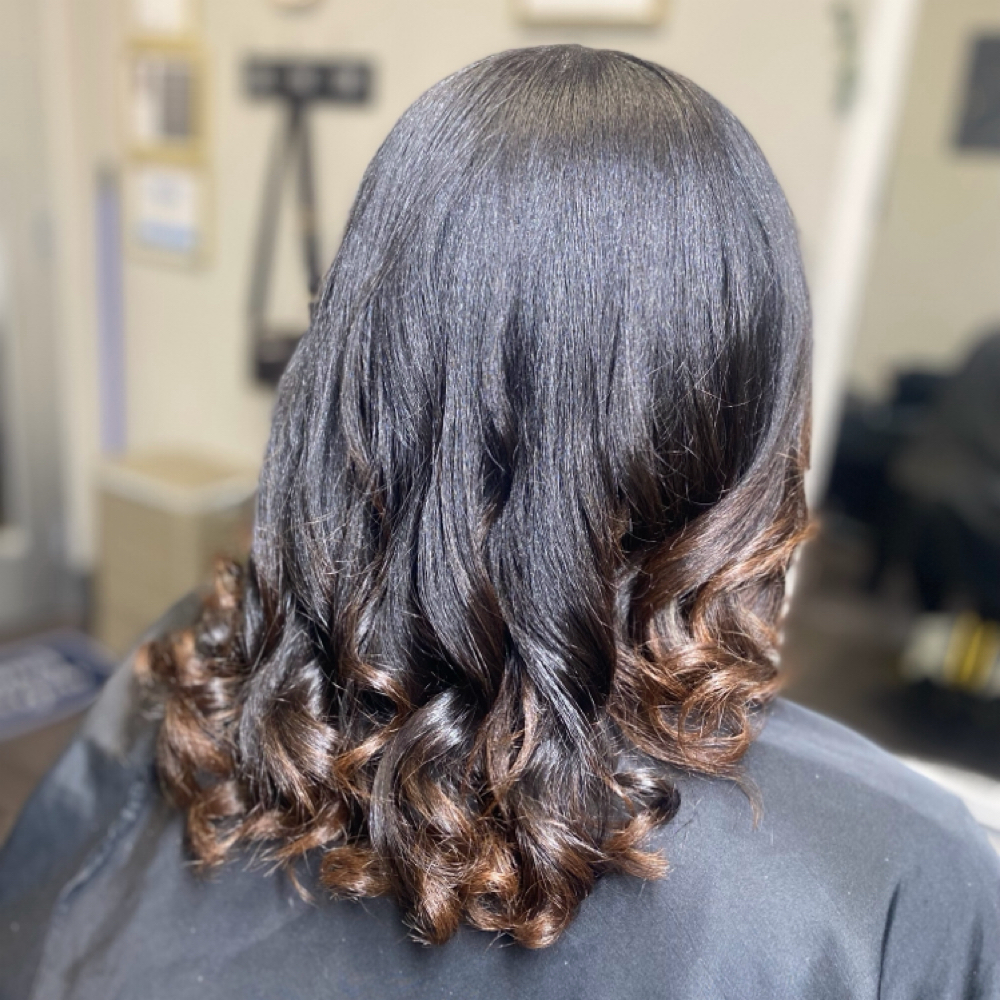 Luxe Silk Press Package at Divine Kinks and Kurls in Liberty Township, OH