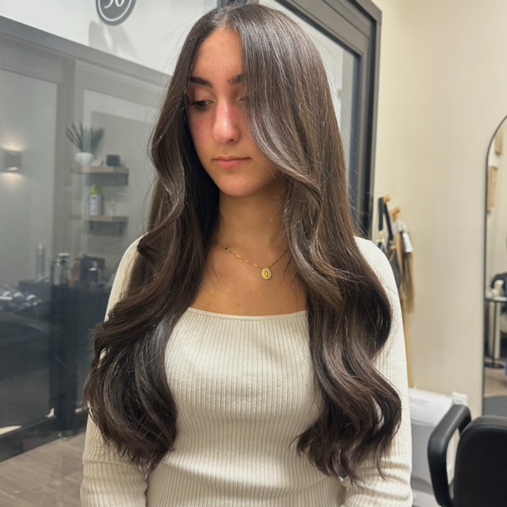 Womans haircut + Toner Refresh