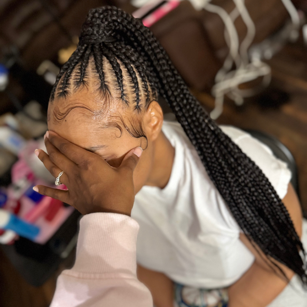 Small Feedin Ponytail/bun at Mejko braid studio in Long Beach, CA