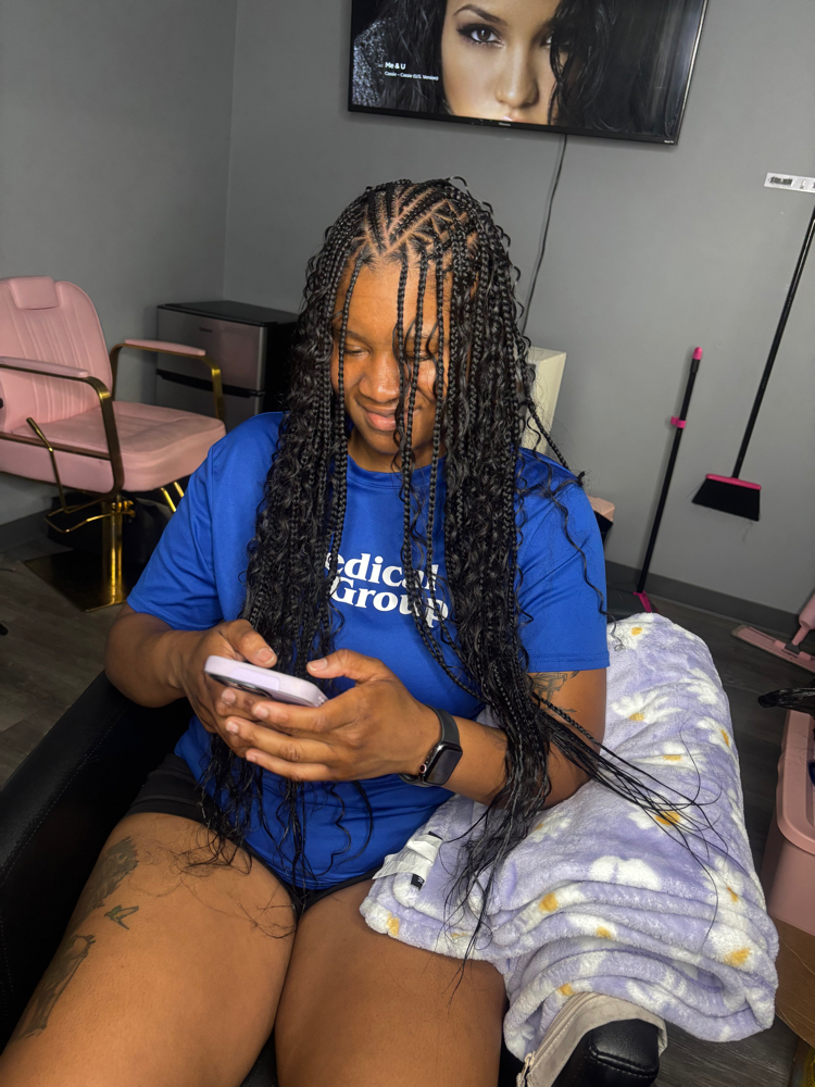 Fulani Braids at Mirakle Lowery in Englewood, OH