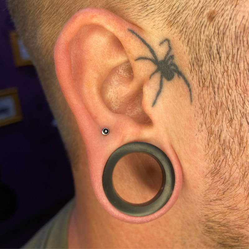 Earlobe Single Piercing at Divine Image Ink Piercings in Parma Heights, OH