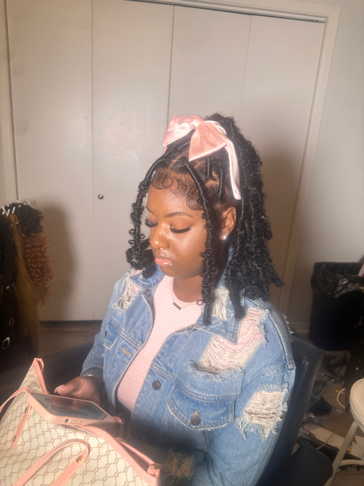 Butterfly locs (shoulder length)