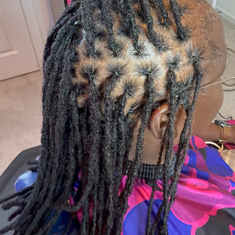 Interlocking Retwist at Loc'd in with Kilo in Forney, TX