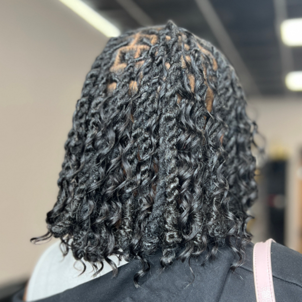 Freestyle Loc Style with added Hair at Anjel Hair and Beauty Studios in College Park, GA
