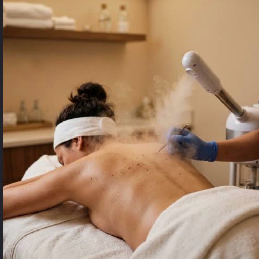 Therapeutic back treatment at Elevate Beauty Lounge in Davenport, IA
