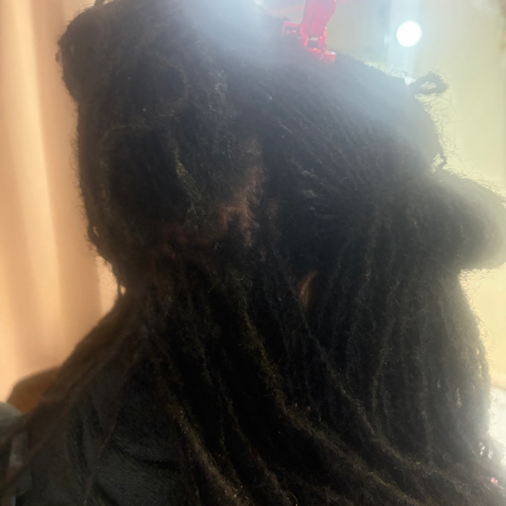 Micro Retie Over Growth at LISA DID IT BRAIDS & LOCS in Martinez, GA