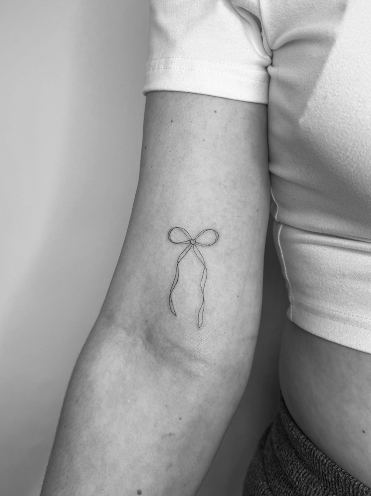 Fine Line Tattoo