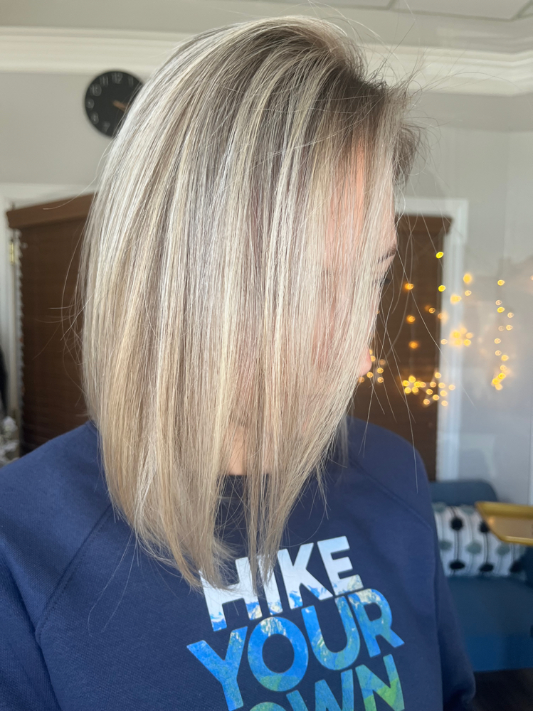 Face-framing blonde correction at Arina Stylist in Roseville, CA