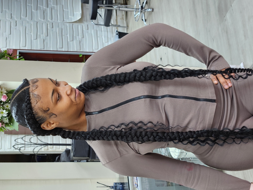 Two Jumbo Cornrows at MaryamuAfricanbraids in Newark, NJ
