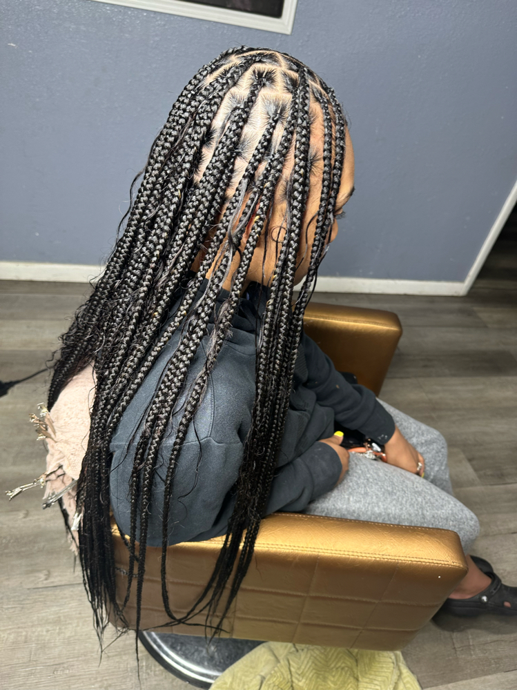 Smedium Bohemian Knotless at HAIRBYREYA in Monroeville, AL