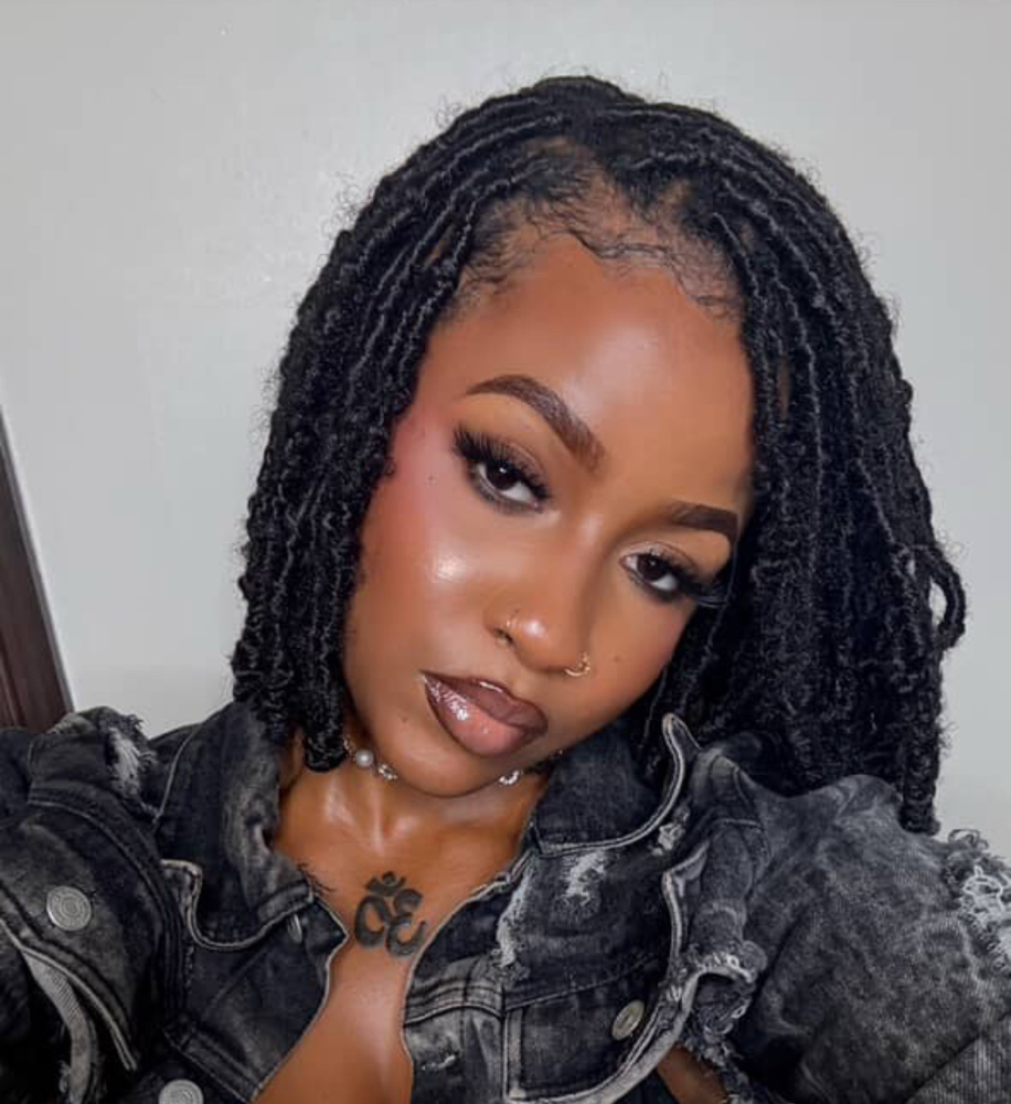 Butterfly locs at Veloré Studios & Co in Stone Mountain, GA