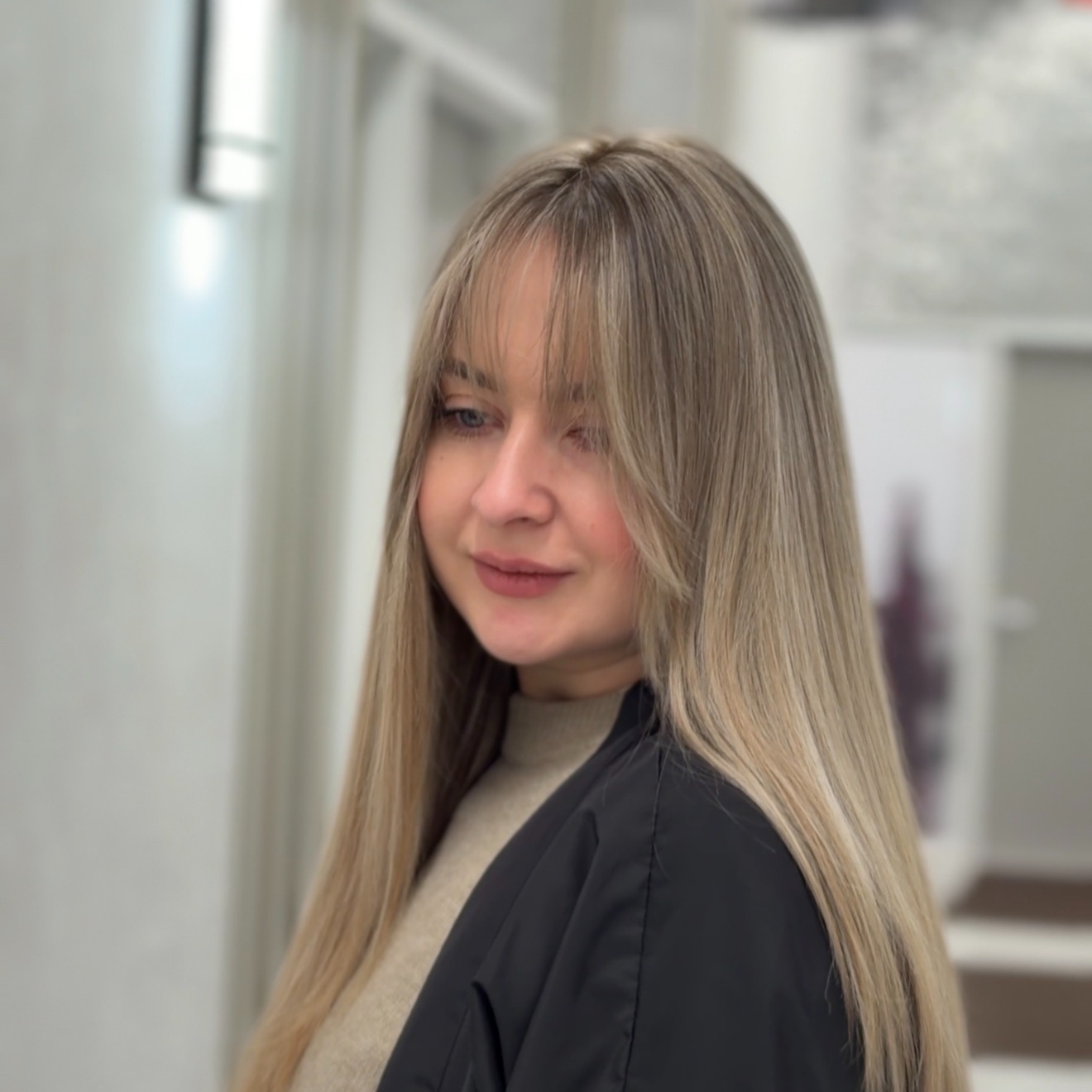 Bangs trim at Verve Hairdesign by Victoria in Glendale Heights, IL