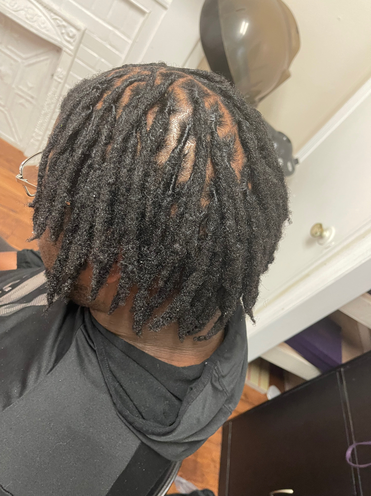 Retwist at CurlyQ Braids & Locs in Columbus, GA