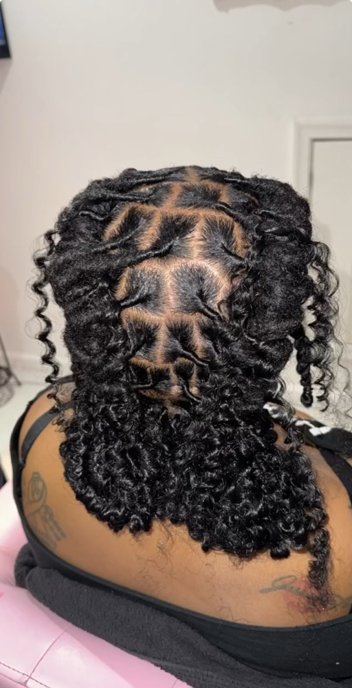 Boho ponytail/bun (16 & under) at Loc’d N Wit Tweet in Temple Hills, MD