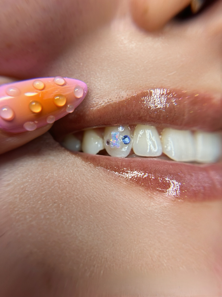 3x Swarovski Tooth Gems at Velvet Moon Hair & Nails Studio in Ventura, CA
