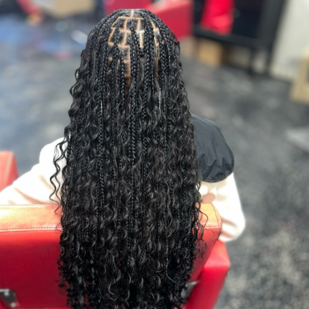 Small Boho Knotless at Exclusive braids & Hair Care in Highland Park, MI