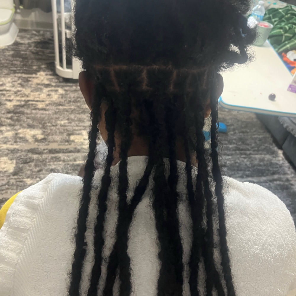 Inter Locs at William Paul Hair Studio & Spa in Melbourne, FL