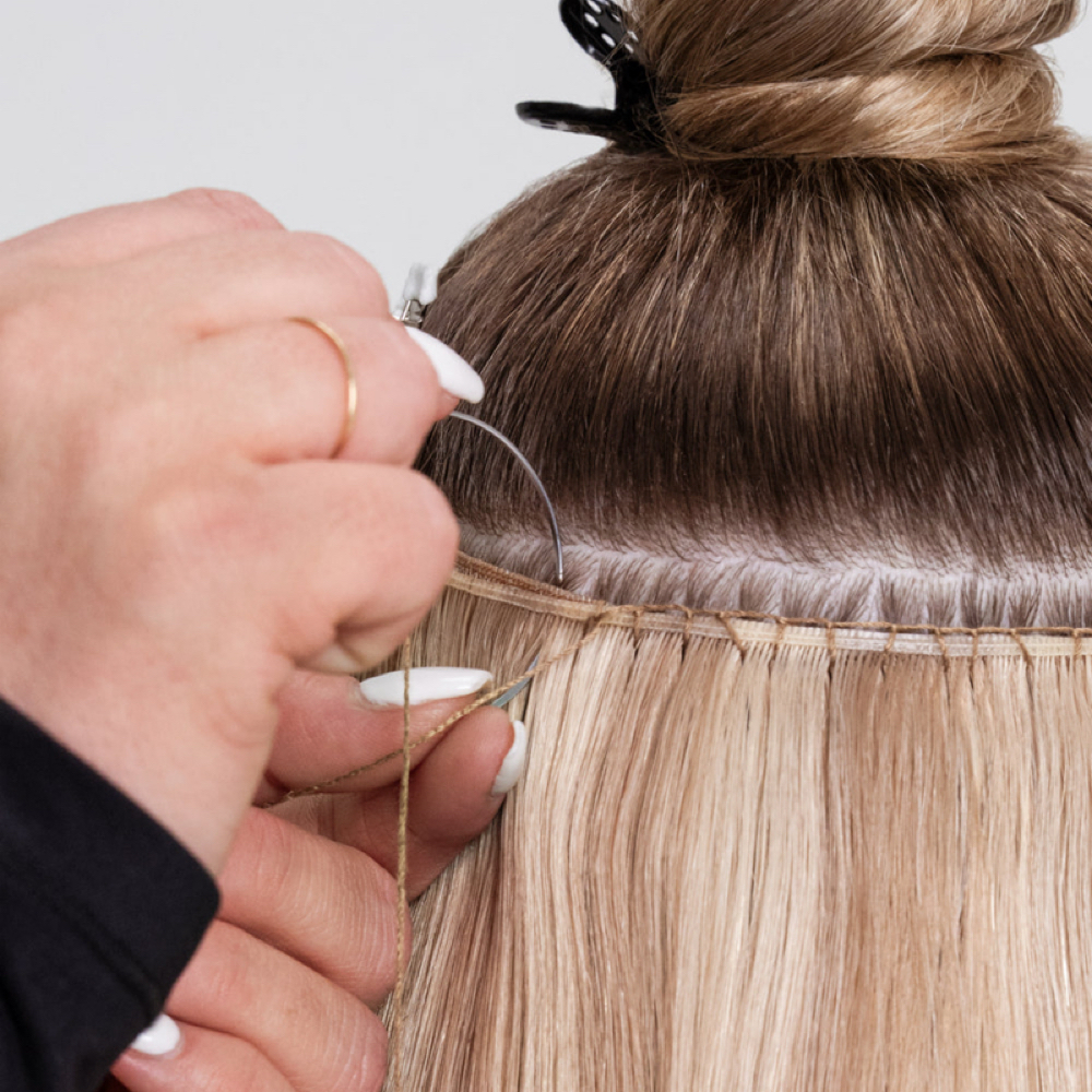 Hair Extensions Weft Installation at Xavier Rey Luiz Hair Studio in Sunset Valley, TX