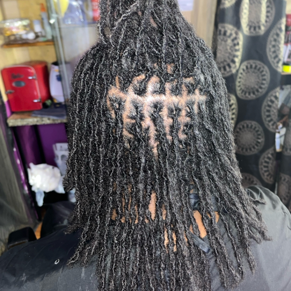 Interlocking Locs Starting price at Kay’s Touch of Klass Hair & Beauty Studio in Converse, TX