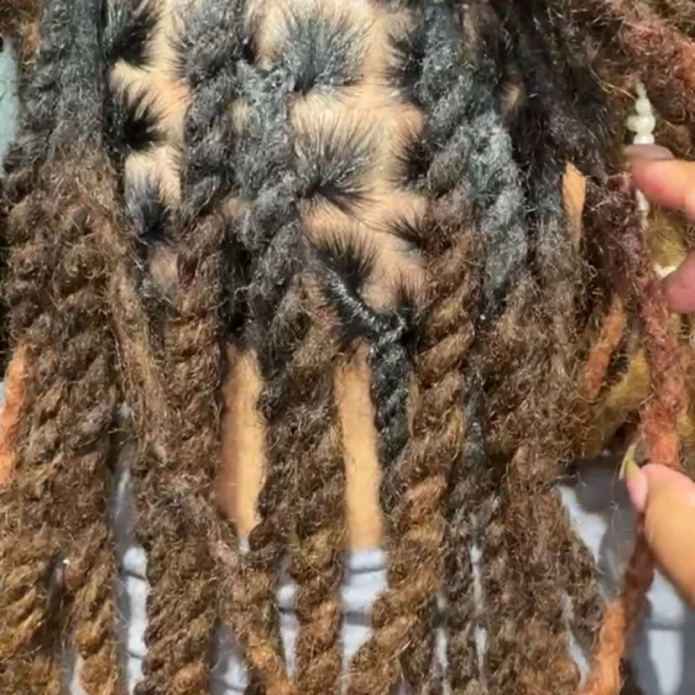 Loc Two Strand Twist at ImpressMeStudio in Rochester, NY