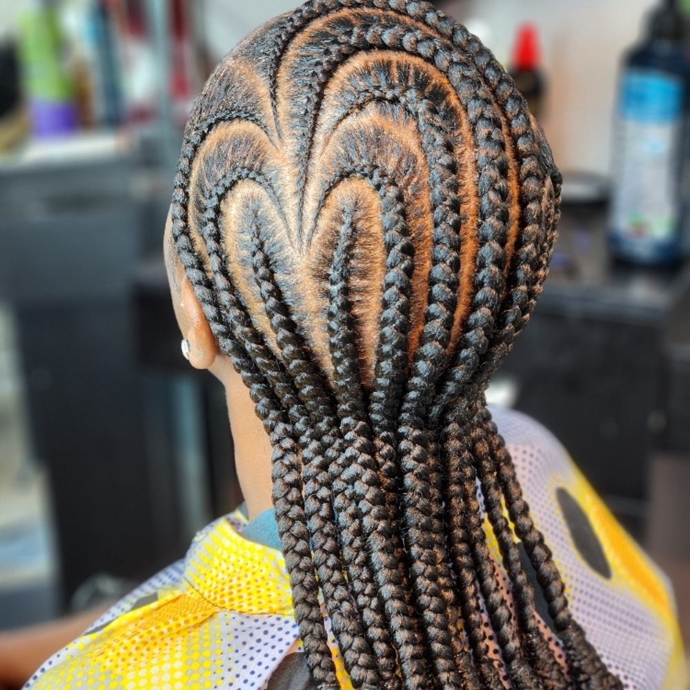 Stitch Cornrows at MaryamuAfricanbraids in Newark, NJ