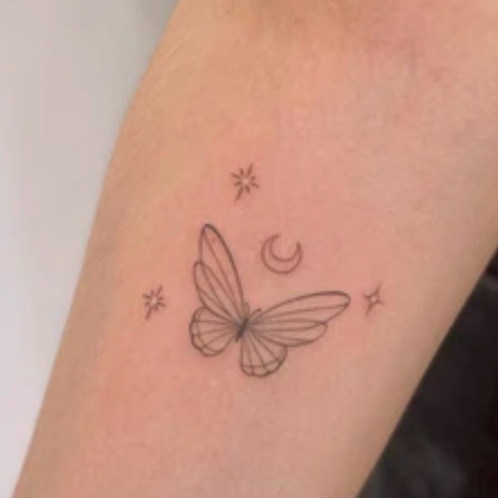 Custom Tiny Tattoo at Brown Haven Salon & Spa in Zanesville, OH