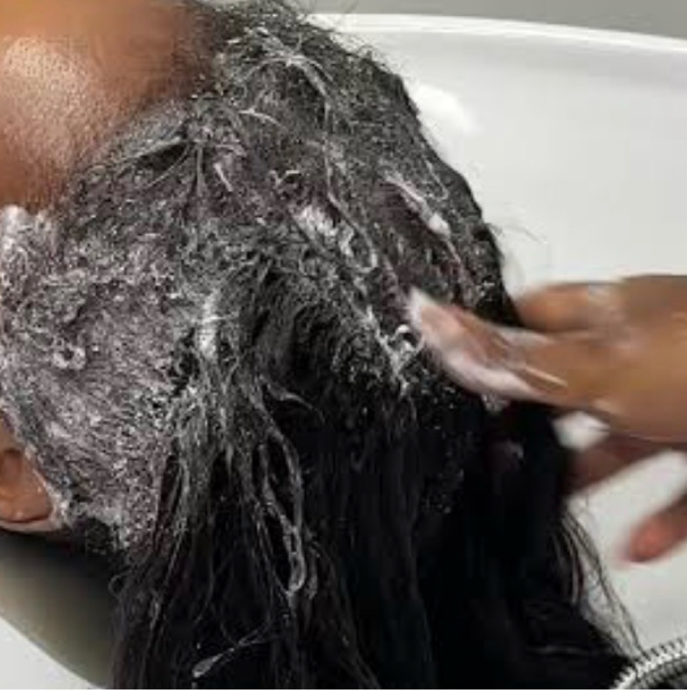 Weave maintenance at Ta’Meca Corner At STUDIO 2904 in Goldsboro, NC