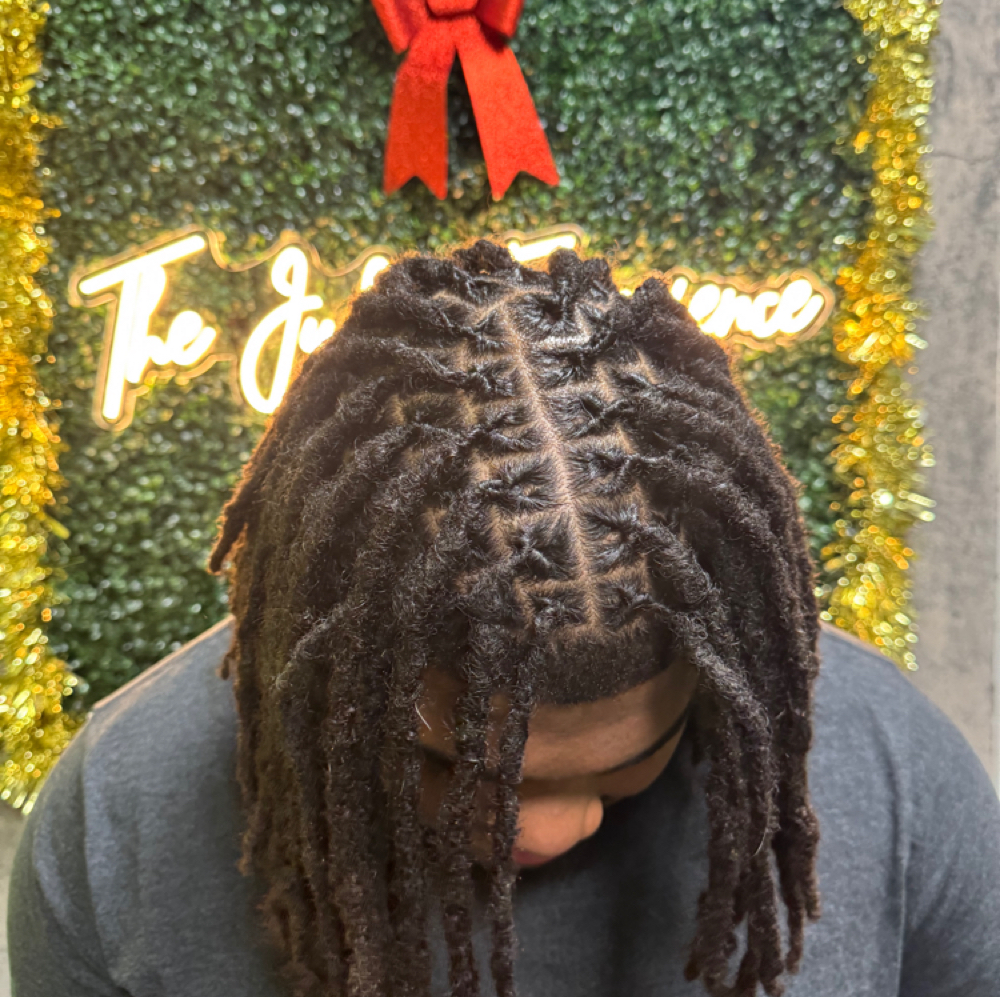 Loc Crown Reset at The Judea Experience LLC in Charlotte, NC