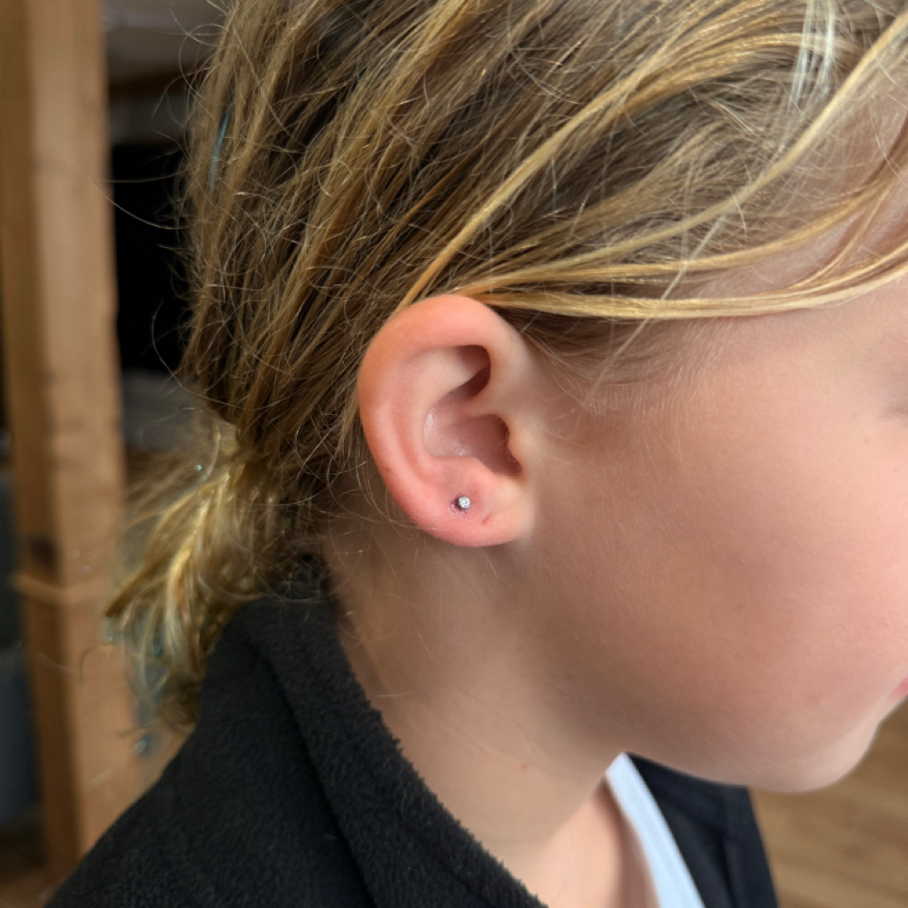 Double Ear Lobe Piercings at The Color Lab in Gonzales, TX