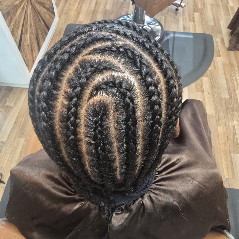Men's Cornrows at The collective salon and barber spa inc in Locust Grove, GA