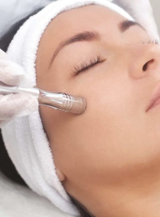 Microdermabrasion + Facial