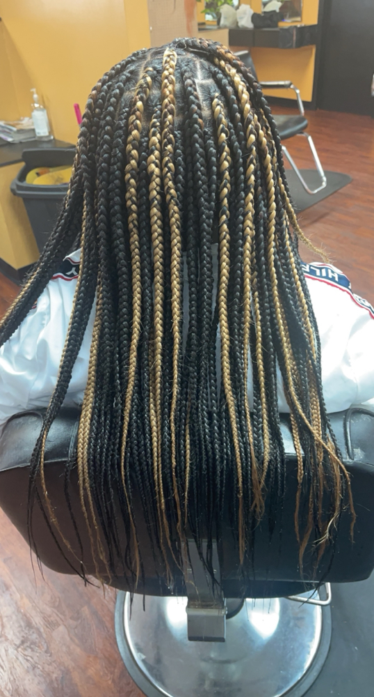 Med Knotless Braids at In The Kut Salon in Toledo, OH