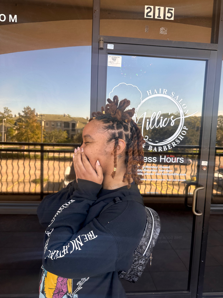 Full Loc Re-twist at Naturally Raw Beauty in Houston, TX