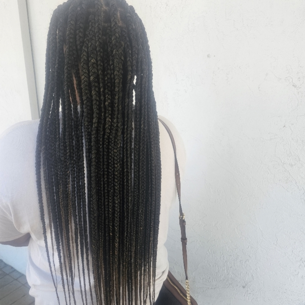Small Traditional box braids at Styles By Carrera in Las Vegas, NV
