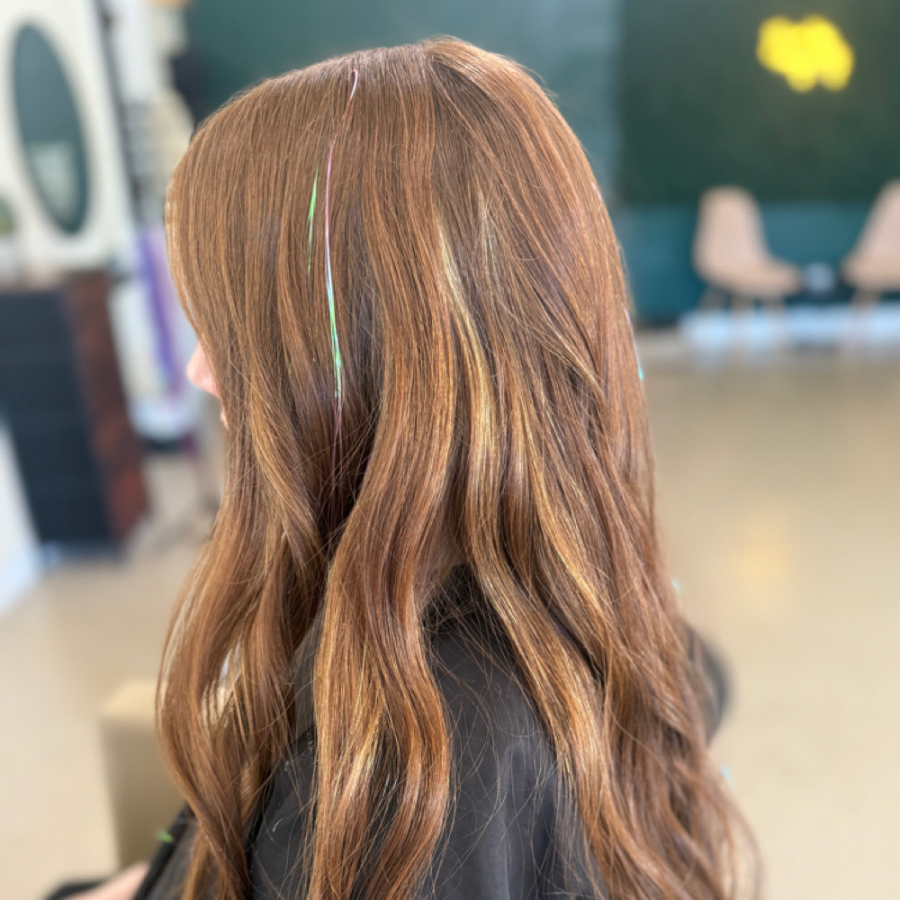 Hair tinsel with a bead at All About Me Beauty Bar in Labelle, FL