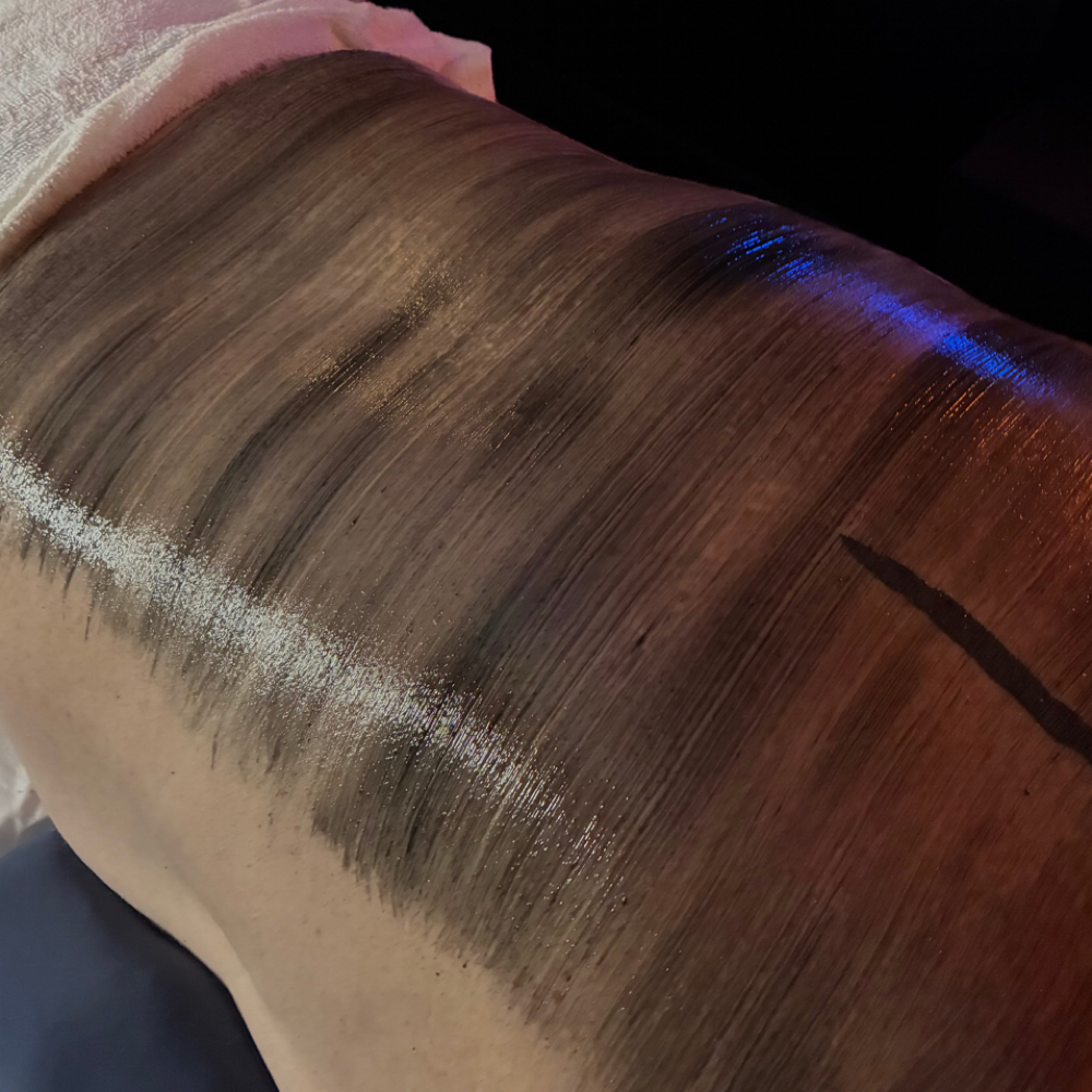 Back Facial Treatment at Essential Esthetics in Edmond, OK