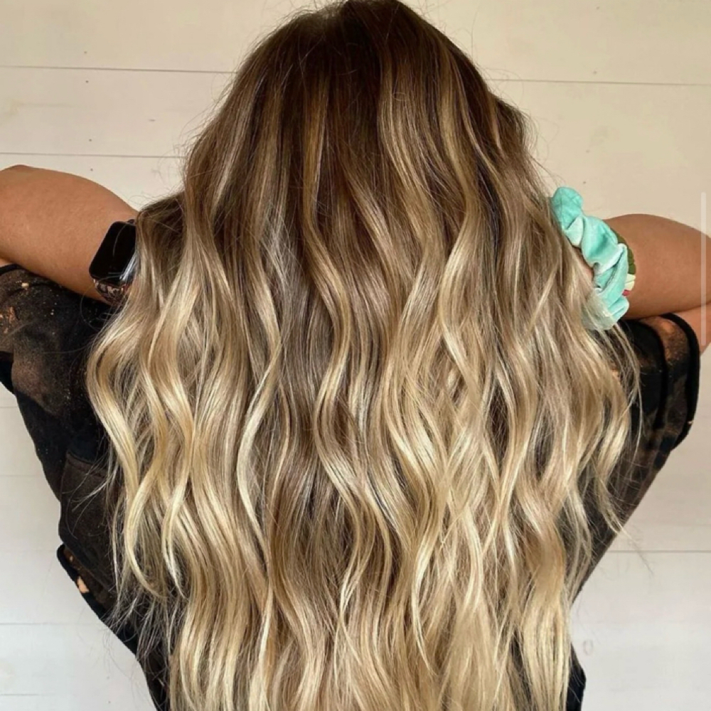 2 Row Hair Extension Move Up at Elegance Salon in Aberdeen, SD