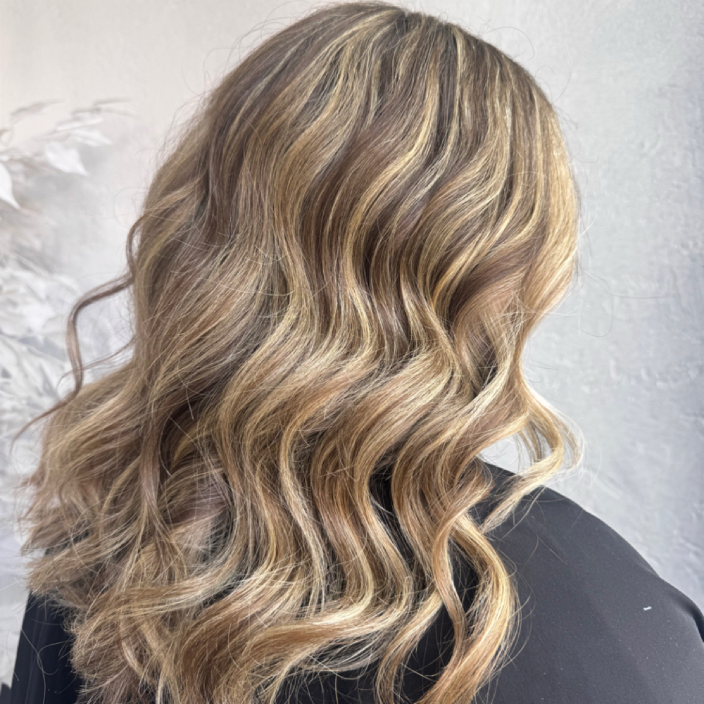 Gloss at GLOW Spa Tanning & Fitness in Owego, NY