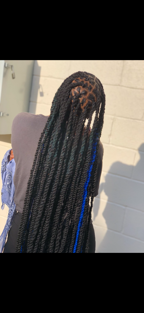 Loc Style with Added Hair at ChariseRenee’J Hands of A Goddess in Kettering, MD