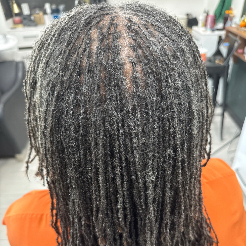 Retie w/shampoo at All Natural LLC in Beaumont, TX