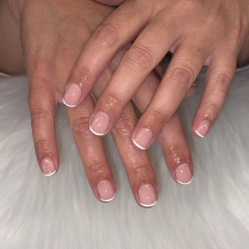 French tips on short nails at Starr Struck Nails LLC in Denver, CO