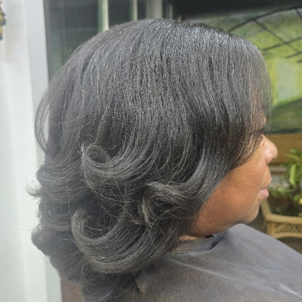 Silk Press at Knotty Opulence Hair Care Studio in Merida, TX